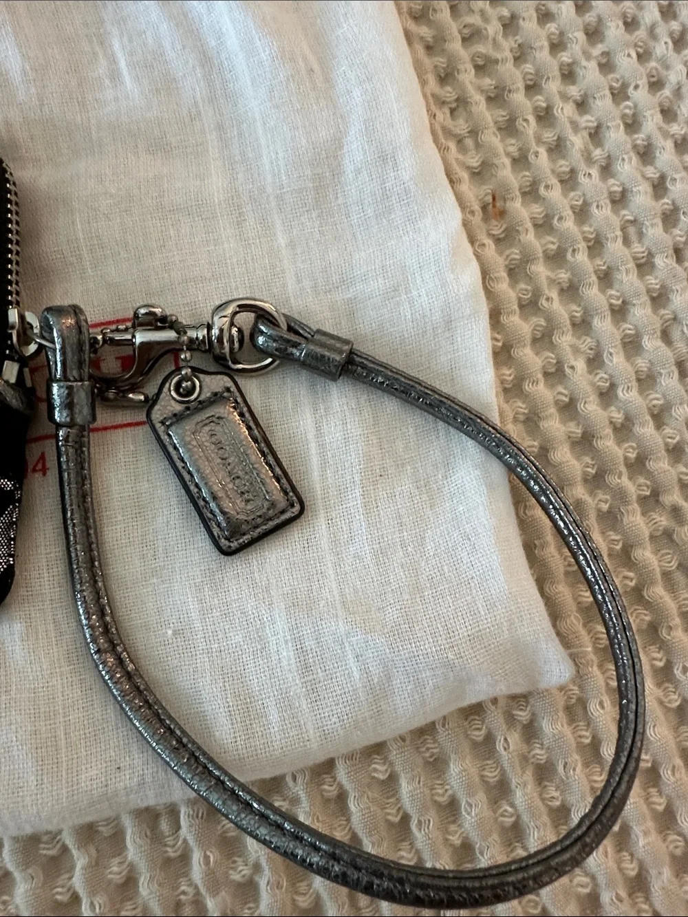 Y2K NWOT, never used.  Coach Poppy Signature Lurex Metallic Wristlet.